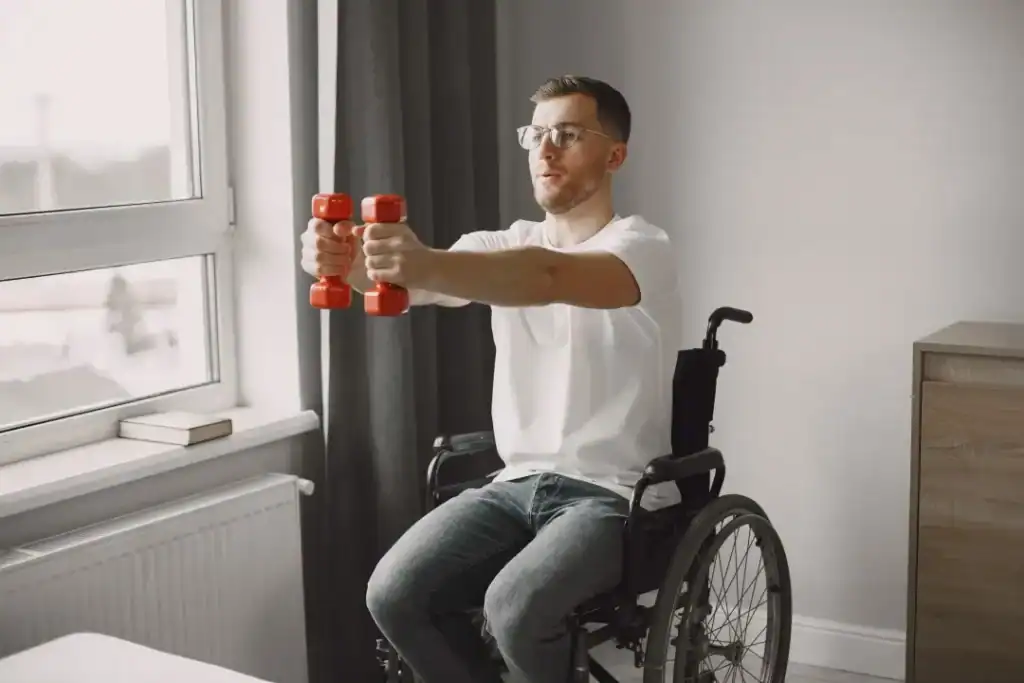 Empowering Weight Loss: A Comprehensive Guide for Individuals with Disabilities 1 Image of man doing exercise in his wheelchair to aid weight loss Sheffield